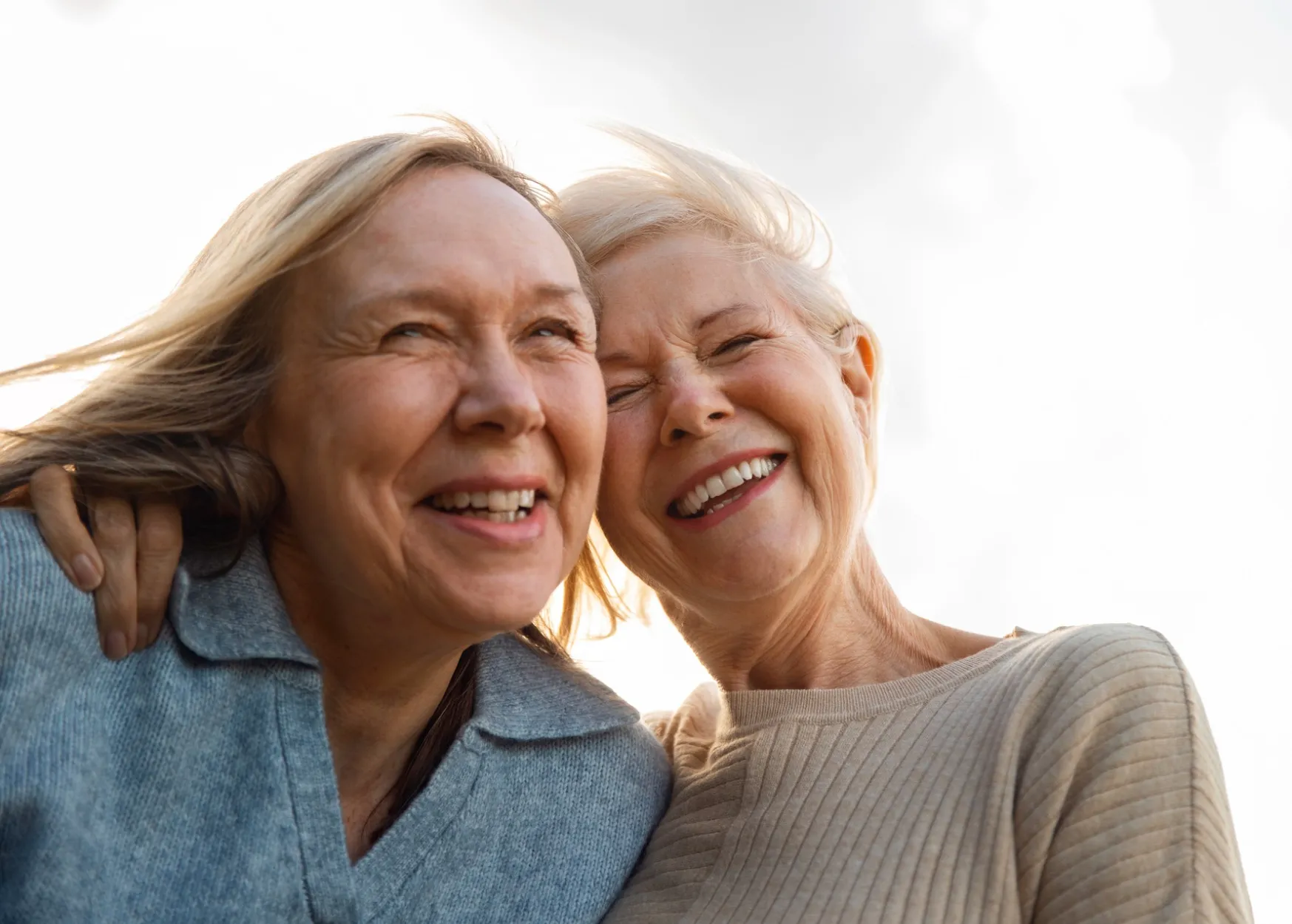 Happy couple of women