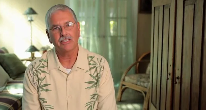 a man wearing glasses