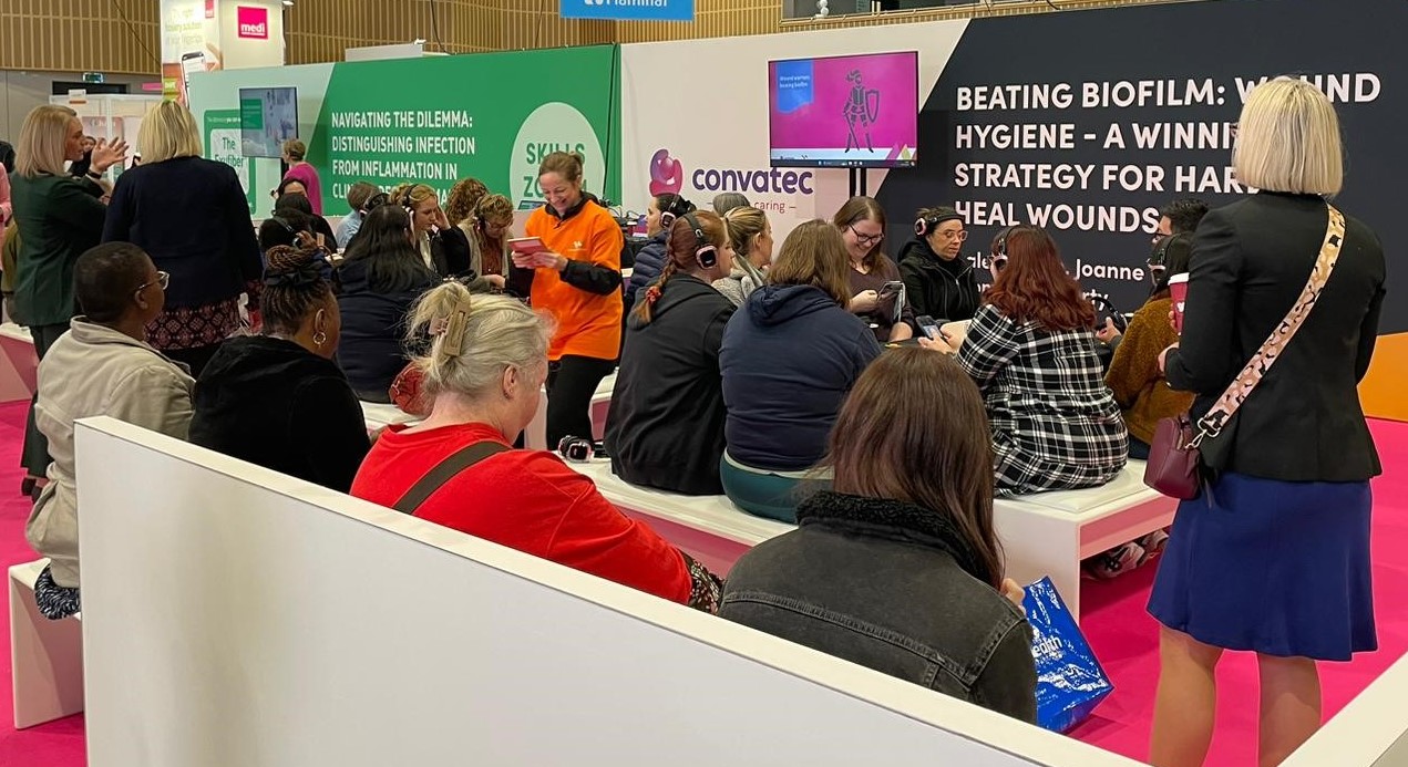 a group of people sitting in a room